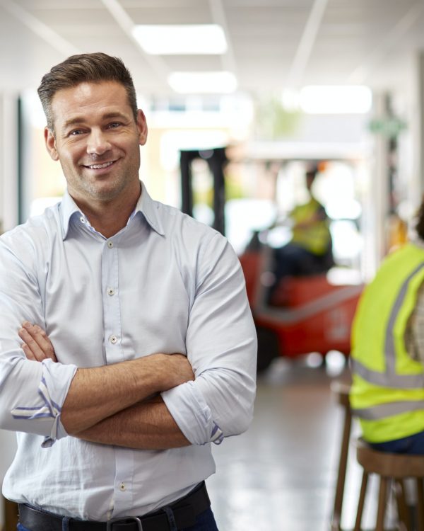 Portrait Of Male Manager In Logistics Distribution Warehouse